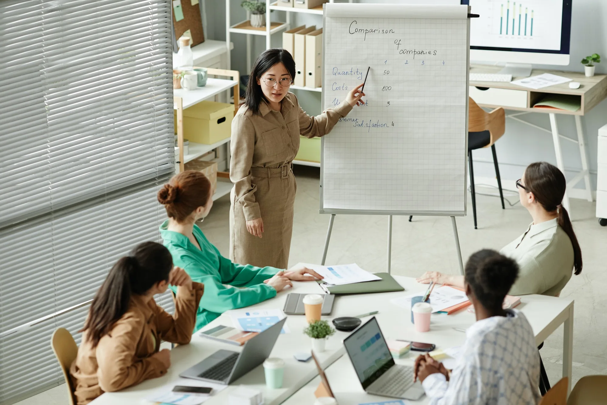 businesswoman presenting report at business training