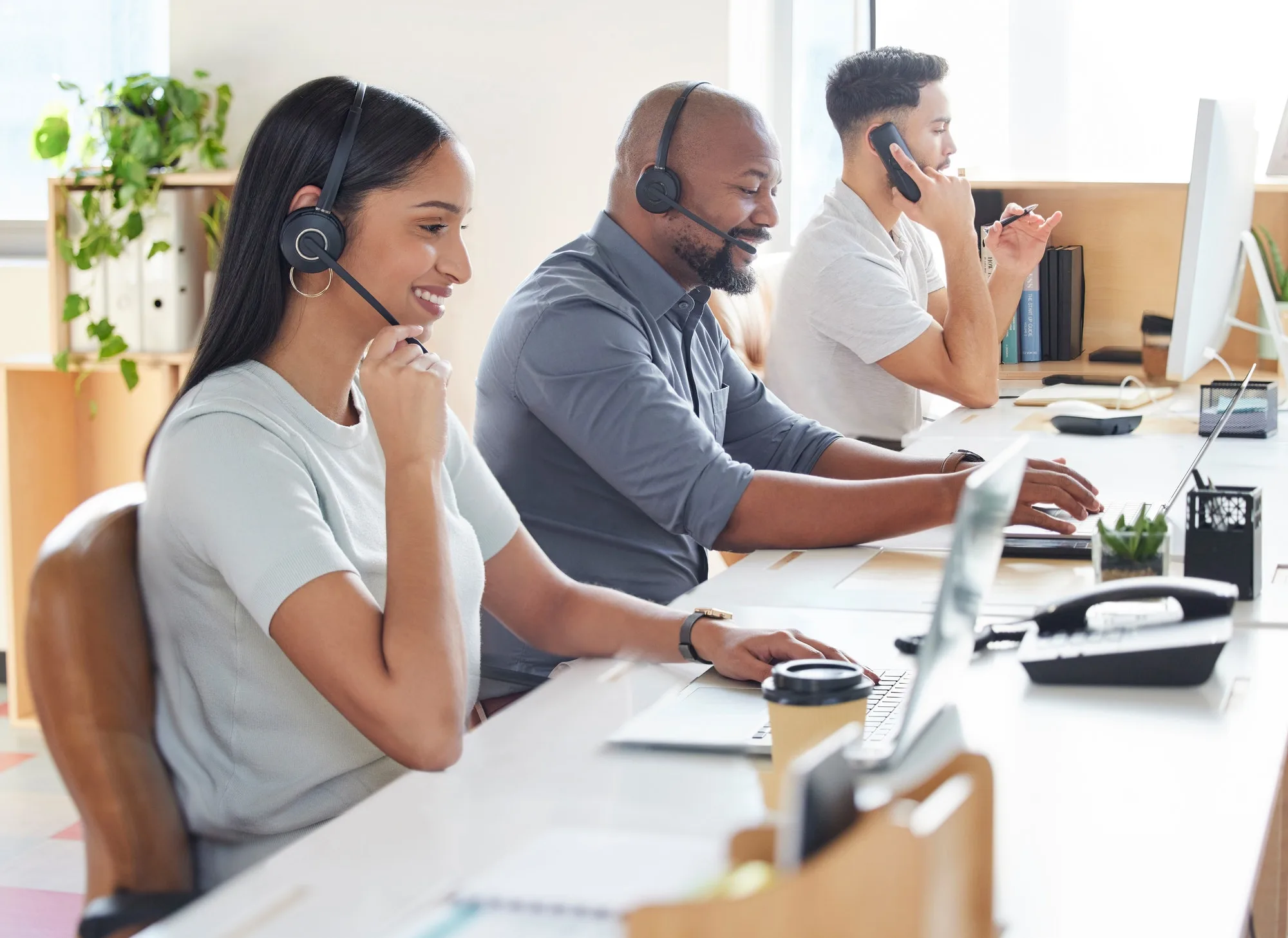 shot of a group of businesspeople working in a call centre